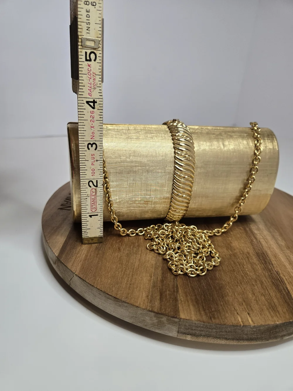 Rodo Gold Metallic Cylinder Clutch with Chain